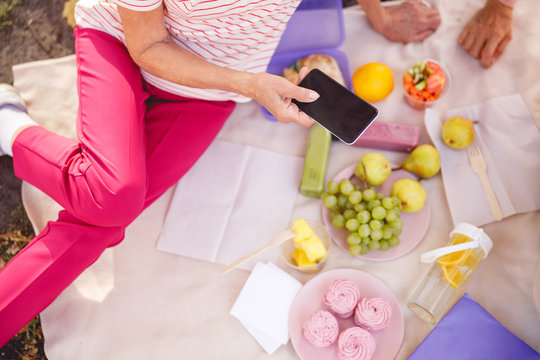 Woman looking for her friends page on social media