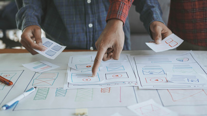 Designers man drawing (UX) (UI) Graphic designer creative sketch planning application process...