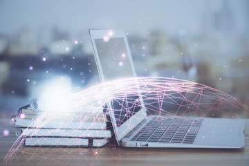 Computer on desktop with social network theme icon. Multi exposure. Concept of international...
