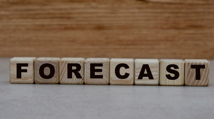concept word forecast on cubes on a wooden background