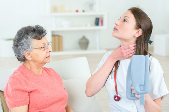picture of an elderly woman with her caregiver doctor