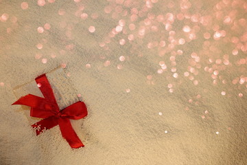 beautiful gift on a white background lies in Styrofoam balls with blasts