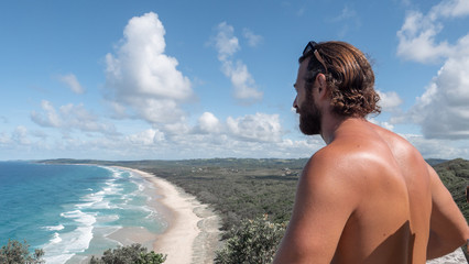 Man standing on the edge of a cliff