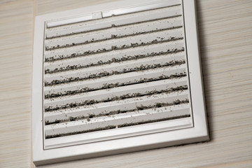 Dirty vent covered by dust requires cleaning