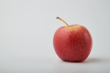 Ripe juicy red apples on white background