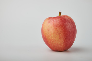 Ripe juicy red apples on white background