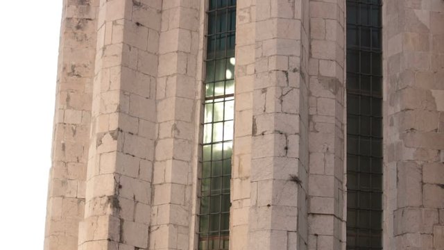 detail of church of venzone, tilt shot of building wall (monument rebuilt after a terrible earthquake)