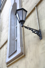 Vintage black iron lantern on a city street