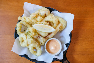 Close up of Fried Squid served on plate.