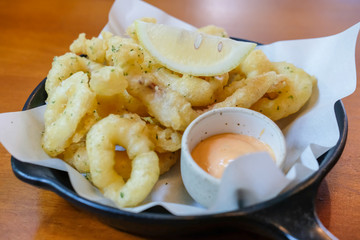 Close up of Fried Squid served on plate.