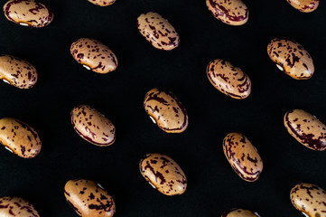 Different beans haricot scattered on the table. Natural products.