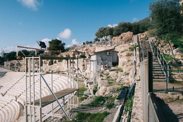 Fototapeta na wymiar Athens, Greece - Dec 20, 2019: Odeon of Herodes Atticus in Acropolis of Athens