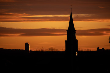 Fototapeta na wymiar Silhouette of church at sunrise, Fuerth, Germany