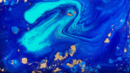 Night blue sky with stars imitation. Acrylic fluid art. Marble blue and gold pattern.