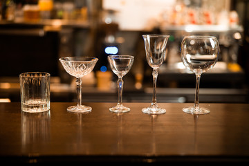 Empty clean glasses at the bar counter