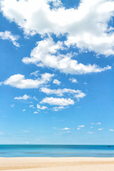 Blue sky with whit cloud, sea and beach background with copy space