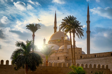 Mosque of Mohamed Ali at sunset - view on the Saladin Citadel in Cairo, Egypt. - obrazy, fototapety, plakaty