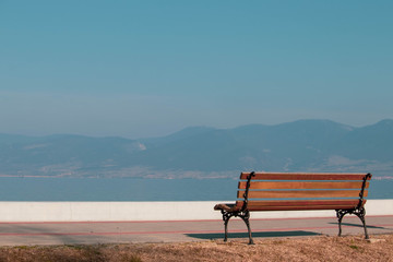 Bench in the park. Bench facing River and Mountain. Bench with beautiful look. 