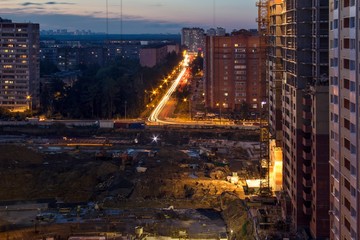 House construction and crane Proletarskay street in Zheleznodorozhny town in Moscow Oblast, Russia....