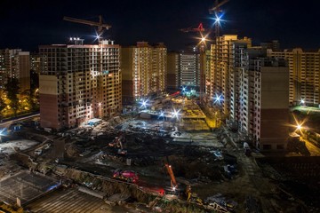 House construction and crane Proletarskay street in Zheleznodorozhny town in Moscow Oblast, Russia....