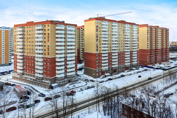 House construction and crane Proletarskay street in Zheleznodorozhny town in Moscow Oblast, Russia....