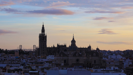 Panoramic view of Seville, Spain city and Old Quarter skyline in a sunset sky scene