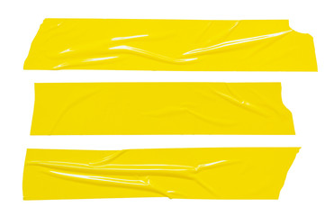 Sticker tape ripped torn pieces. Yellow adhesive tapes set isolated on white background