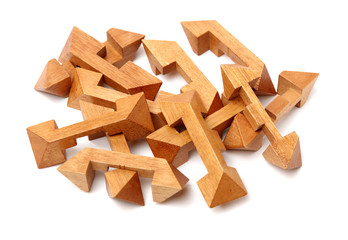 wooden puzzle over white background