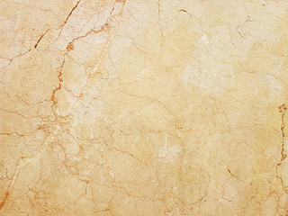 The plate is made of yellow marble with a red streaks. brownish-white shades. Smooth texture for design and decoration. Natural building material. Natural patterns on the stone. Plates for floor