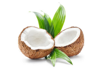 Two halves of delicious coconut with green leaves, isolated on white