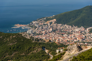Fototapeta premium Top View Of The Town Of Budva With High Mountains. Montenegro