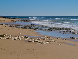 Beautiful beach Praia da Oura in Albufeira at the blue Atlantic ocean