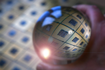 Detail of Computer CPU Chip reflected in to a crystal lensball. abstract background. tecnology background.