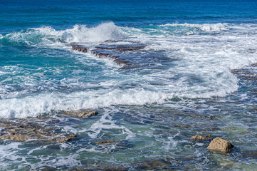  landscape of rocky seashore in clear windy weather