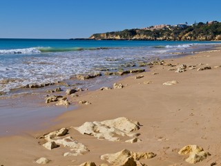 Beautiful beach Praia da Oura in Albufeira at the blue Atlantic ocean