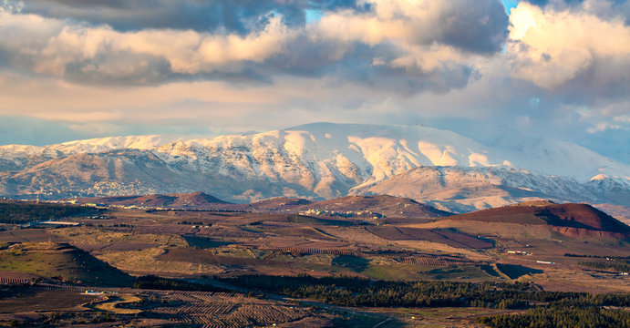 Snow on Hermon mountain with blue sky and clouds landscape view