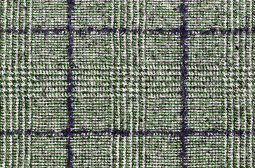 Classic Glenurquhart check is made of woolen fabric. Violet, light green color. Herringbone tweed,...