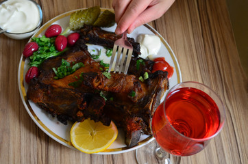 National Armenian food. Charred shashlik with vegetables background. Nutritional and substantial meal