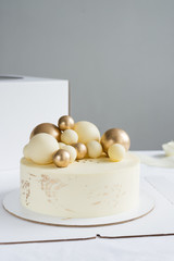 Cake for a holiday with chocolate Golden balls