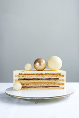 Cake for a holiday with chocolate Golden balls