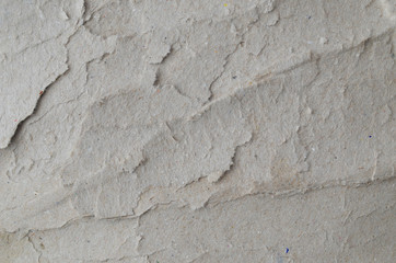 Creative background with scattered overlay of crumpled papers.