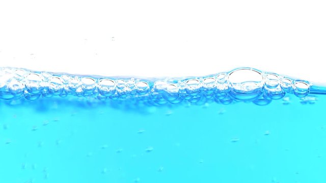  water with bubbles on a white background slow motion