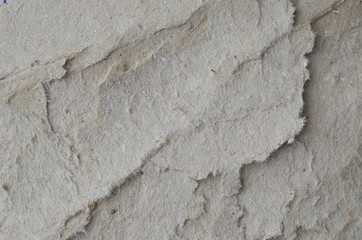 Creative background with scattered overlay of crumpled papers.