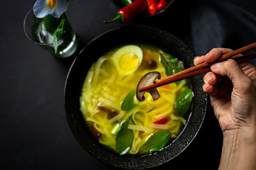 Oriental noodles soup in a restaurant