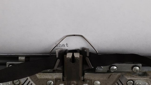 typing text what about you, old vintage typewriter with a sheet of paper