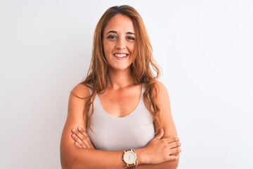 Young redhead woman wearing casual t-shirt stading over white isolated background happy face...