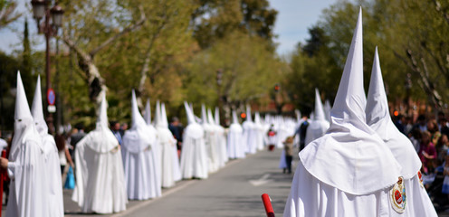 the silent Easter processions of hooded penitents