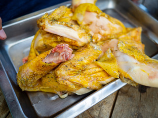 Fresh chicken that has been cut for use in food processing