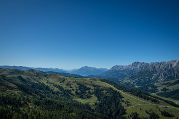 Fototapeta premium view over the Alps mountain panorama with view of the schneeberg hochkönig in Austria