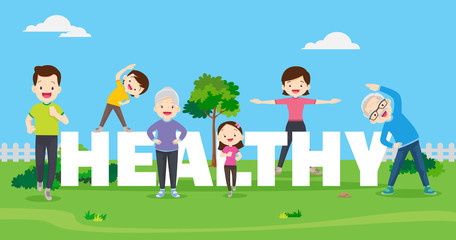 Fototapeta premium Big happy family exercising together with HEALTHY Word letter in public park.